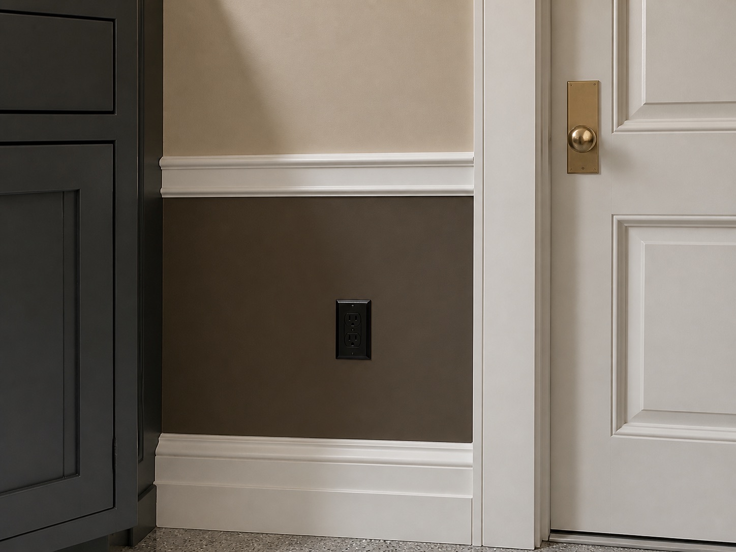 Close view of precise garage wall color transitions, crisp satin trim, clean door casing, and finished cabinet edge